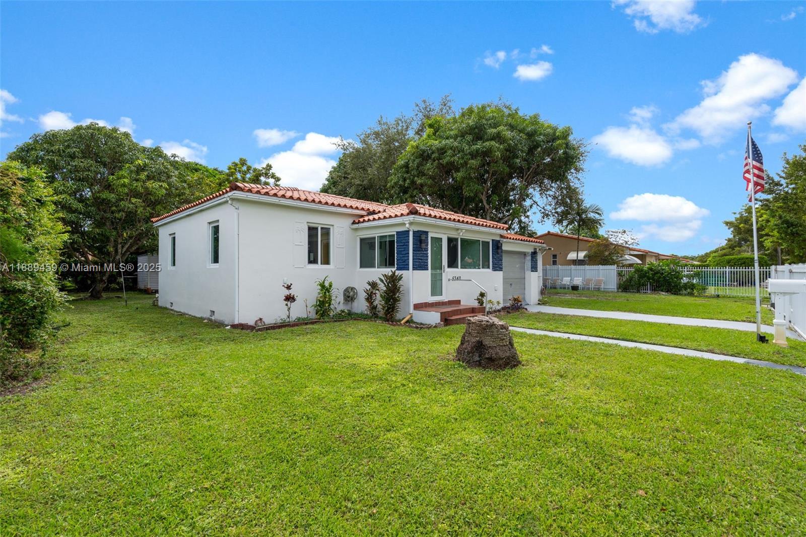 5340 Southwest 5th Street Miami, FL 33134 - Photo 5 of 43 a view of a house with backyard and garden