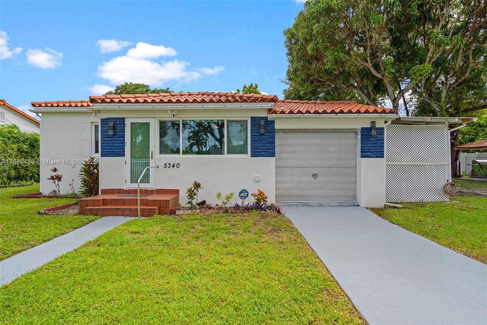 5340 Southwest 5th Street Miami, FL 33134 - Photo 6 of 43 a front view of house with a garden