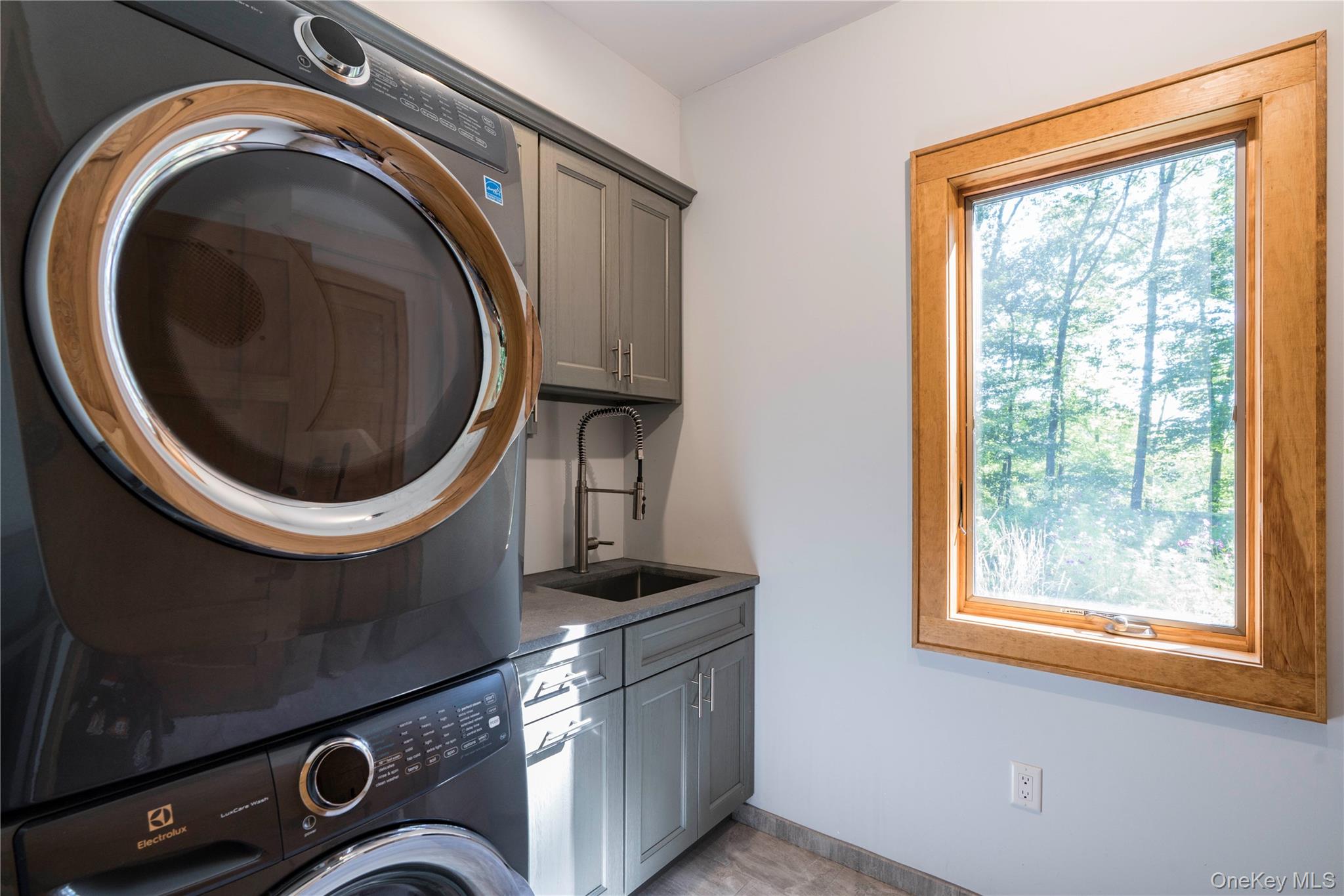 105 Iron Mountain Road Warwick, NY 10990 - Photo 37 of 49 Laundry Room has Plenty Cabinets, a Sink & Dekton Countertop