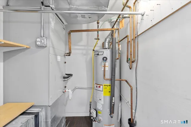 a bathroom with a tub and a shower