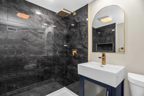 a view of a balcony with wooden floor