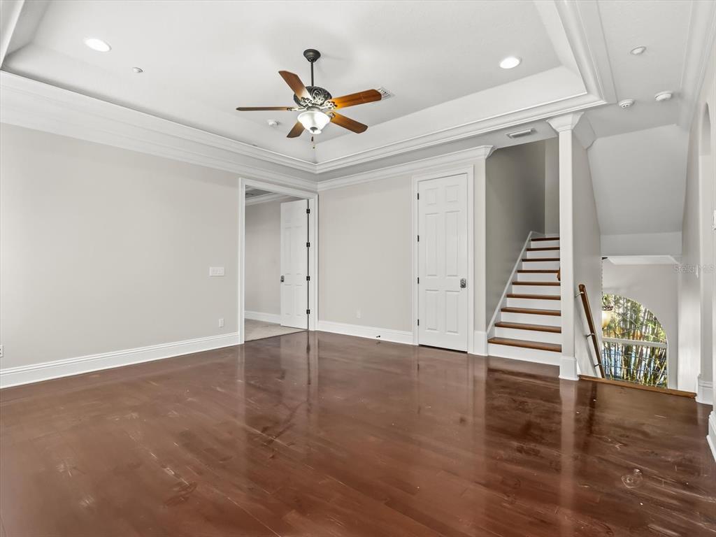 1554 Corolla Court Reunion, FL 34747 - Photo 19 of 71 wooden floor in an empty room with a window
