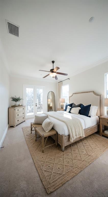 1554 Corolla Court Reunion, FL 34747 - Photo 22 of 75 a spacious bedroom with bed and a chandelier