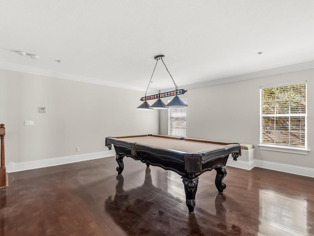 1554 Corolla Court Reunion, FL 34747 - Photo 31 of 71 a room with a table and a window