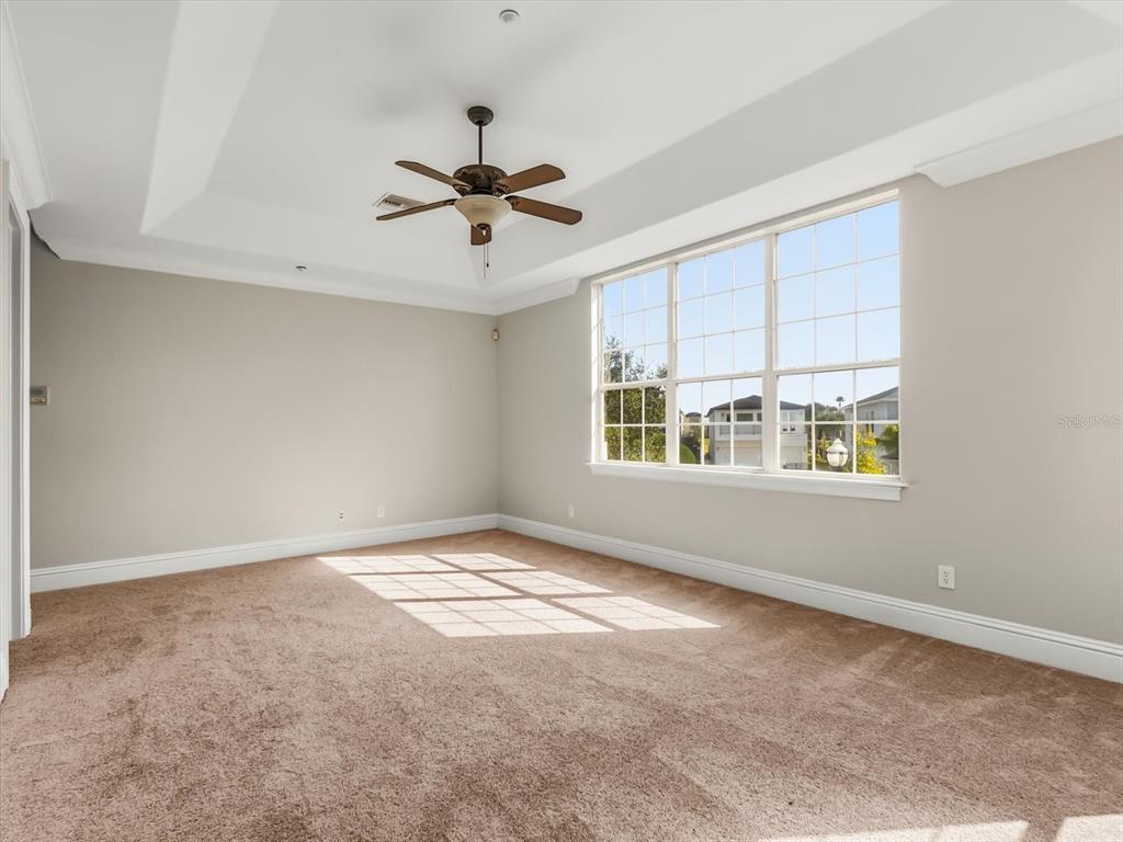1554 Corolla Court Reunion, FL 34747 - Photo 51 of 75 a view of an empty room with a window