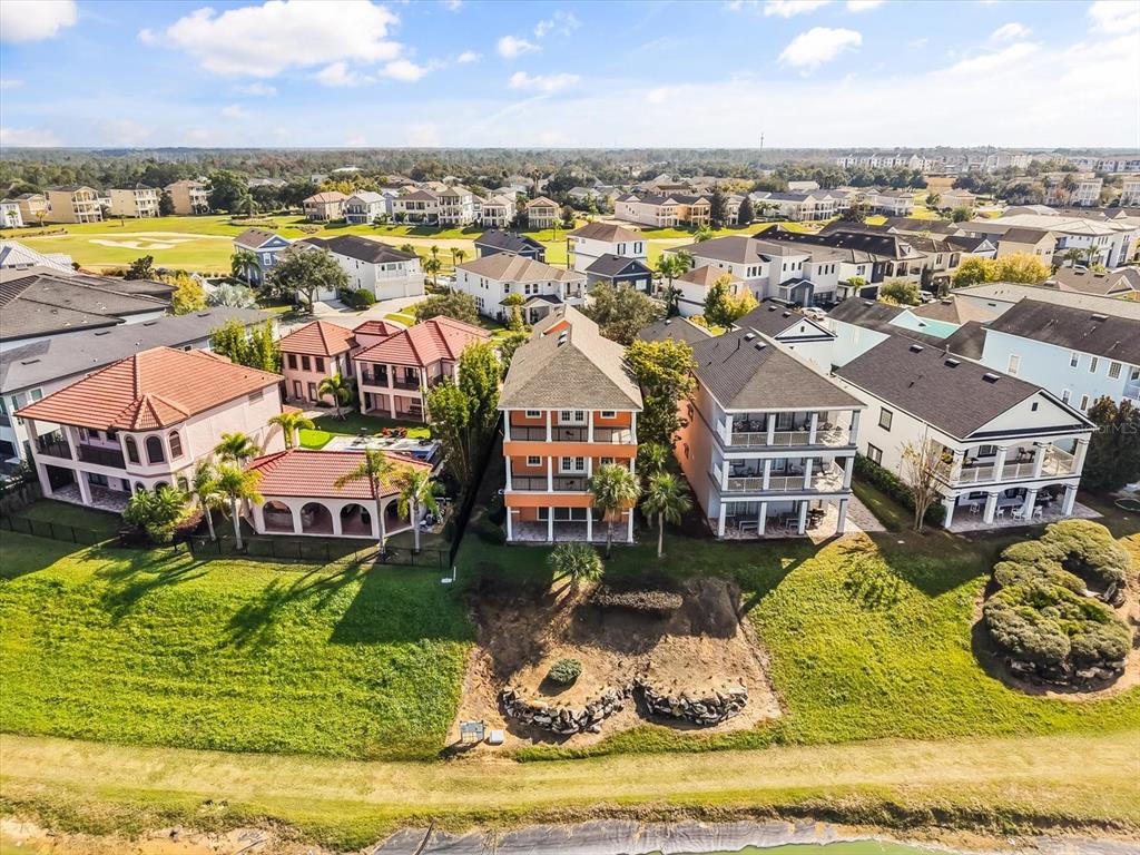 1554 Corolla Court Reunion, FL 34747 - Photo 62 of 71 an aerial view of a house with swimming pool and ocean view