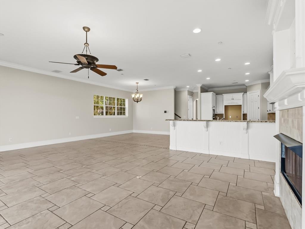 1554 Corolla Court Reunion, FL 34747 - Photo 9 of 71 a view of a kitchen with furniture and a kitchen