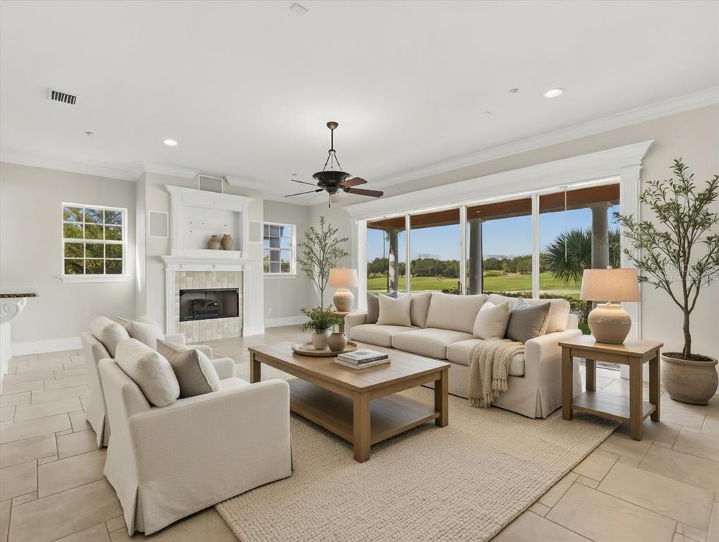1554 Corolla Court Reunion, FL 34747 - Photo 9 of 75 a living room with furniture and a large window