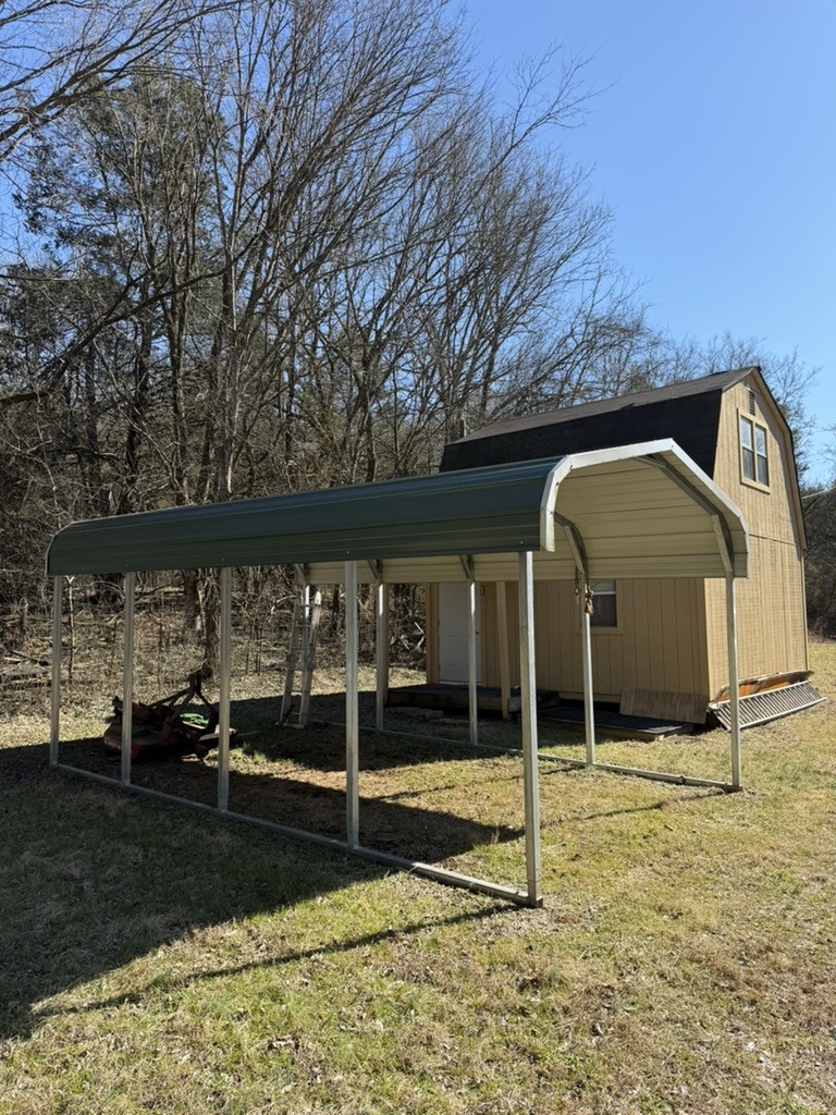 0 New Herman Road Fayetteville, TN 37334 - Photo 16 of 32 a view of a wooden house with a yard