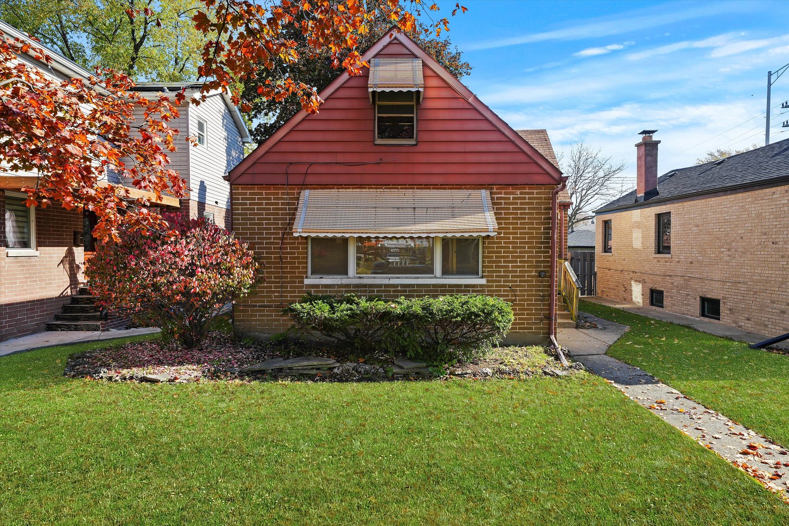 3203 Lincoln Street Franklin Park, IL 60131 - Photo 1 of 33 a front view of a house with a yard