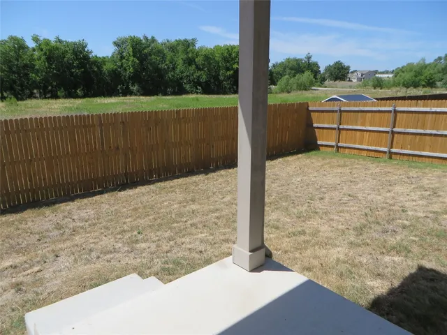 a view of outdoor space and yard