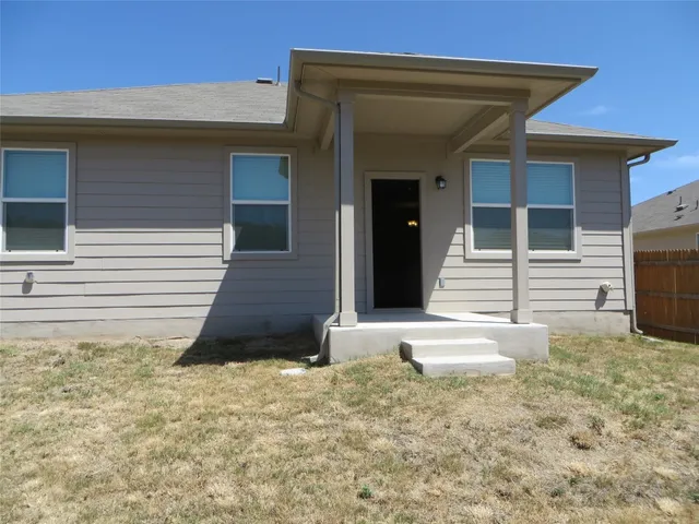 a view of entrance gate of the house