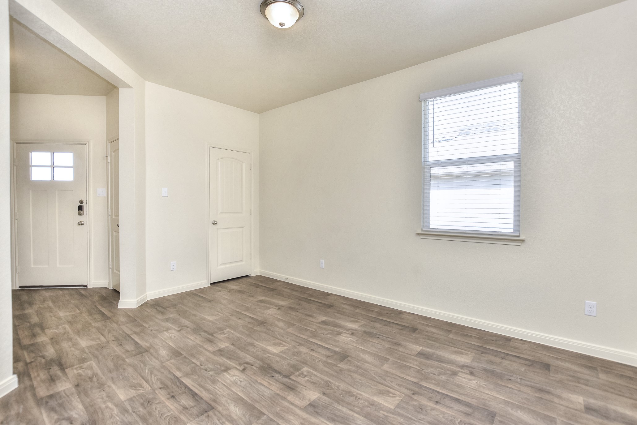 6201 Kildare Drive Georgetown, TX 78626 - Photo 4 of 29 Empty room with baseboards and wood finished floors