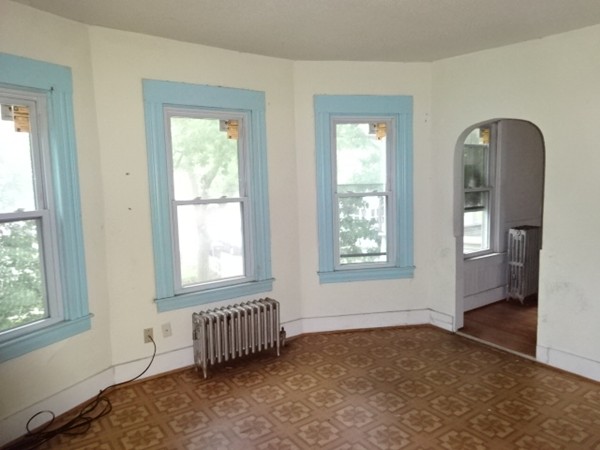 256 White Street Springfield, MA 01108 - Photo 10 of 15 a view of an empty room with a window
