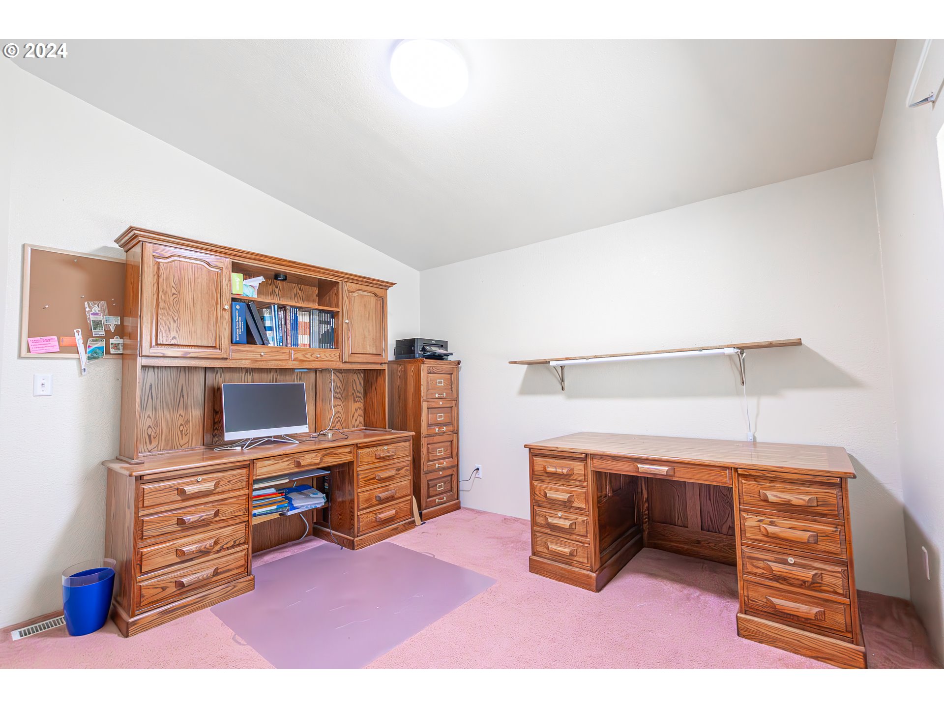 710 North Howe Street Carlton, OR 97111 - Photo 16 of 31 a room with furniture and a flat screen tv