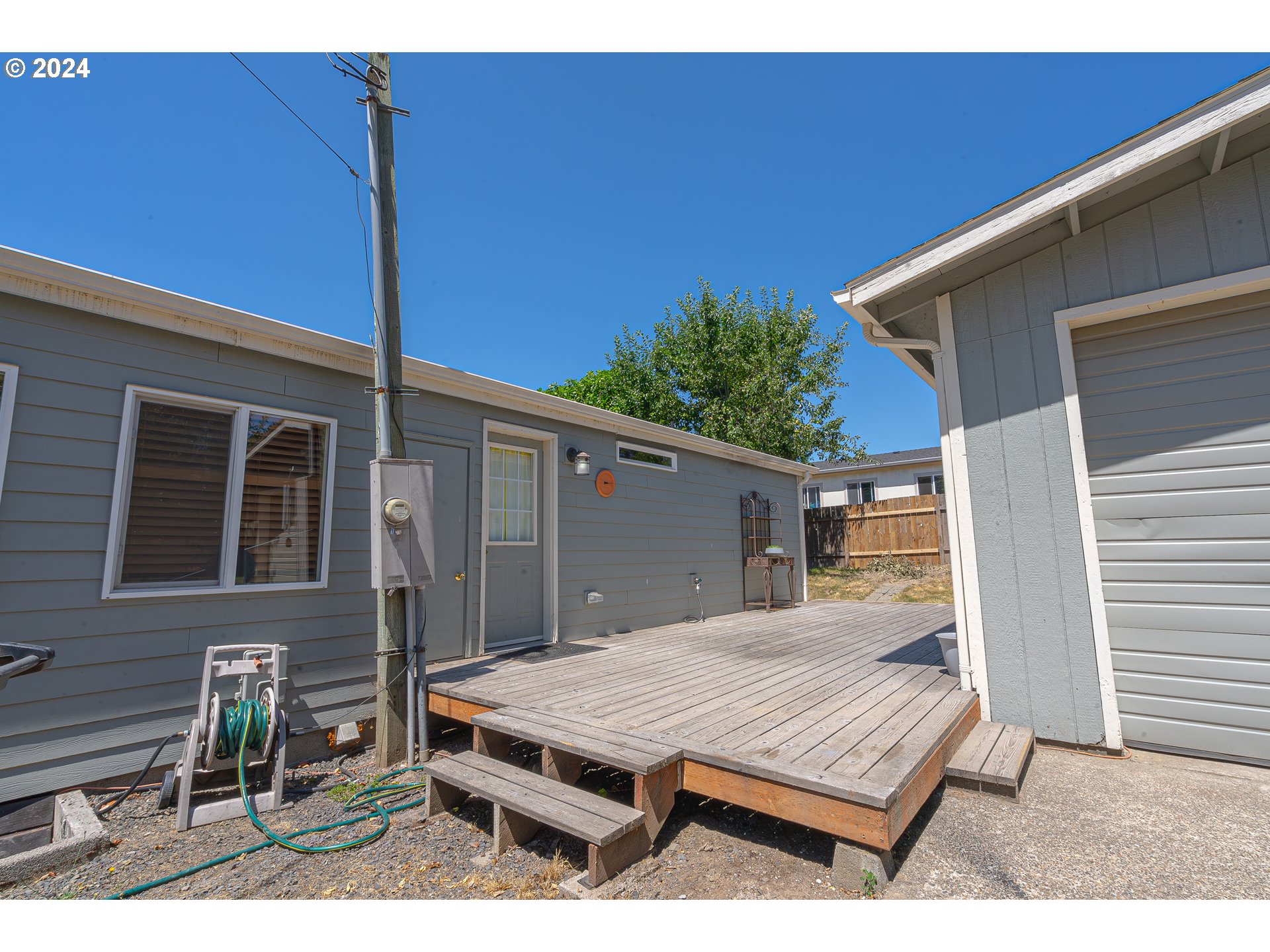 710 North Howe Street Carlton, OR 97111 - Photo 22 of 31 a view of house with a patio