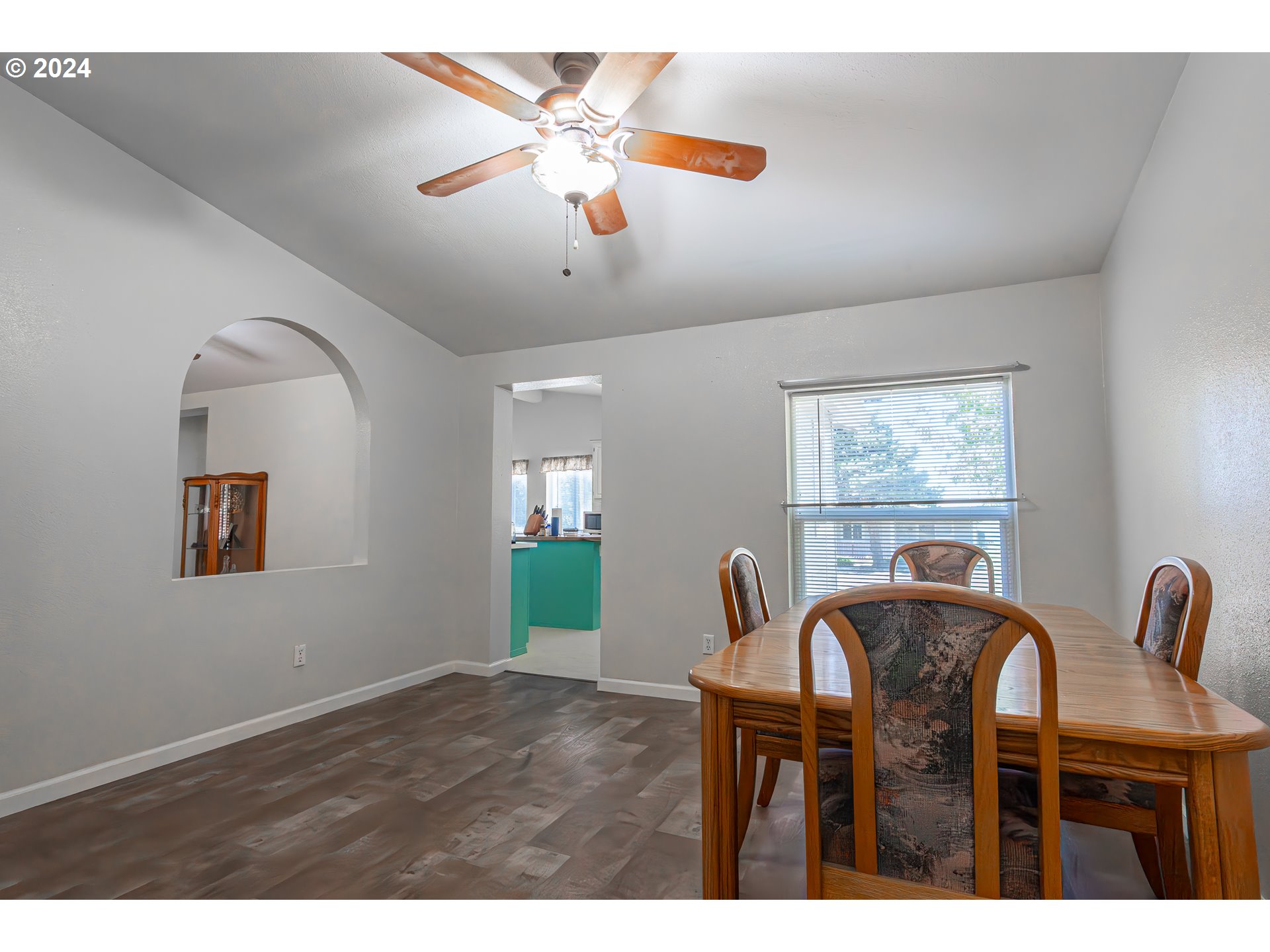 710 North Howe Street Carlton, OR 97111 - Photo 9 of 31 a view of a livingroom with furniture window and wooden floor