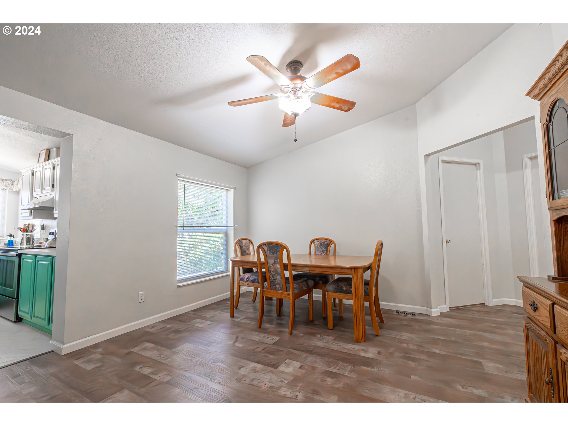 710 North Howe Street Carlton, OR 97111 - Photo 10 of 31 a view of a dining room with furniture and chandelier