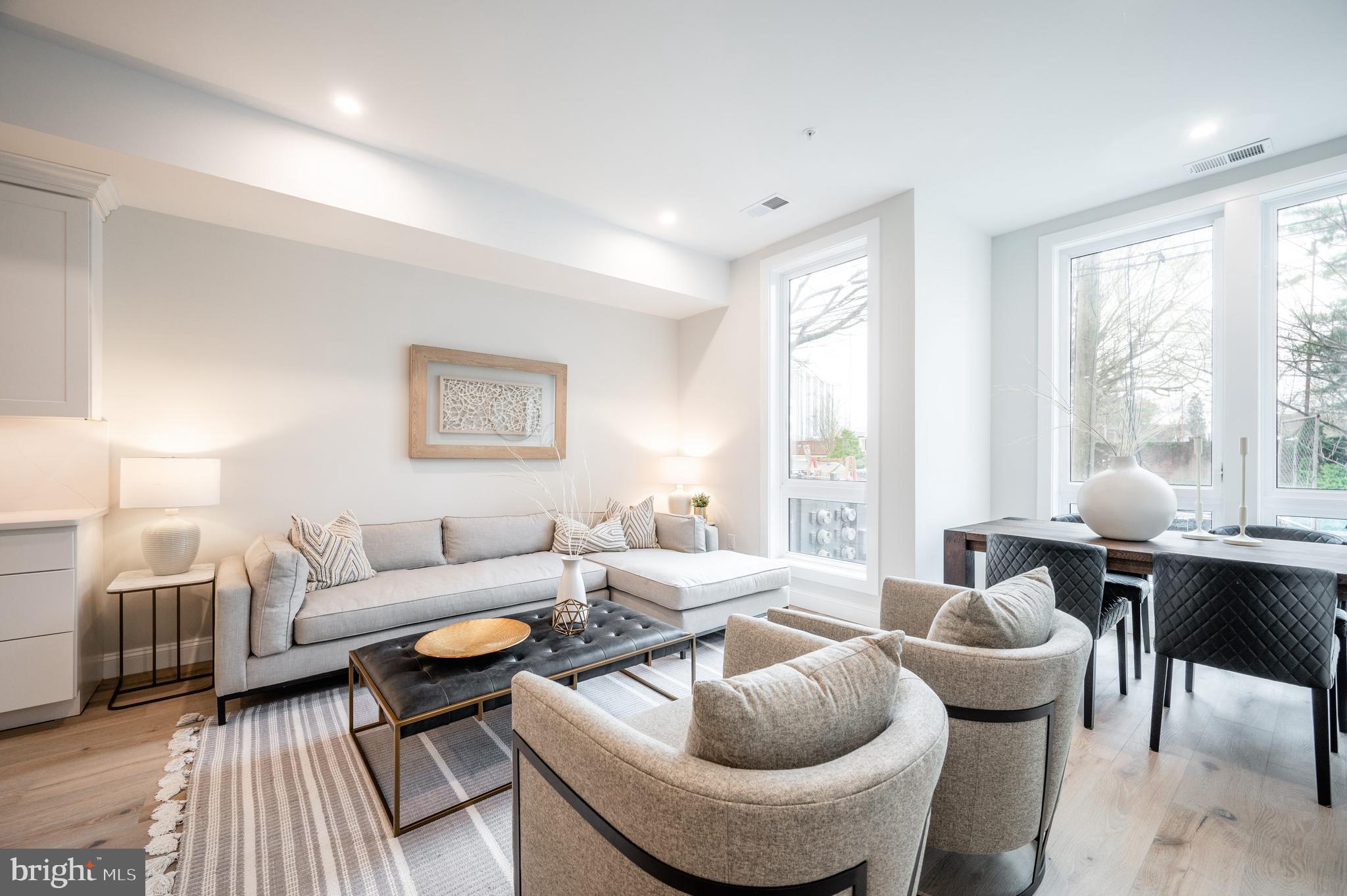 4319 Harrison Street Northwest, Unit 4 Washington, DC 20015 - Photo 3 of 13 Features multiple floor to ceiling windows