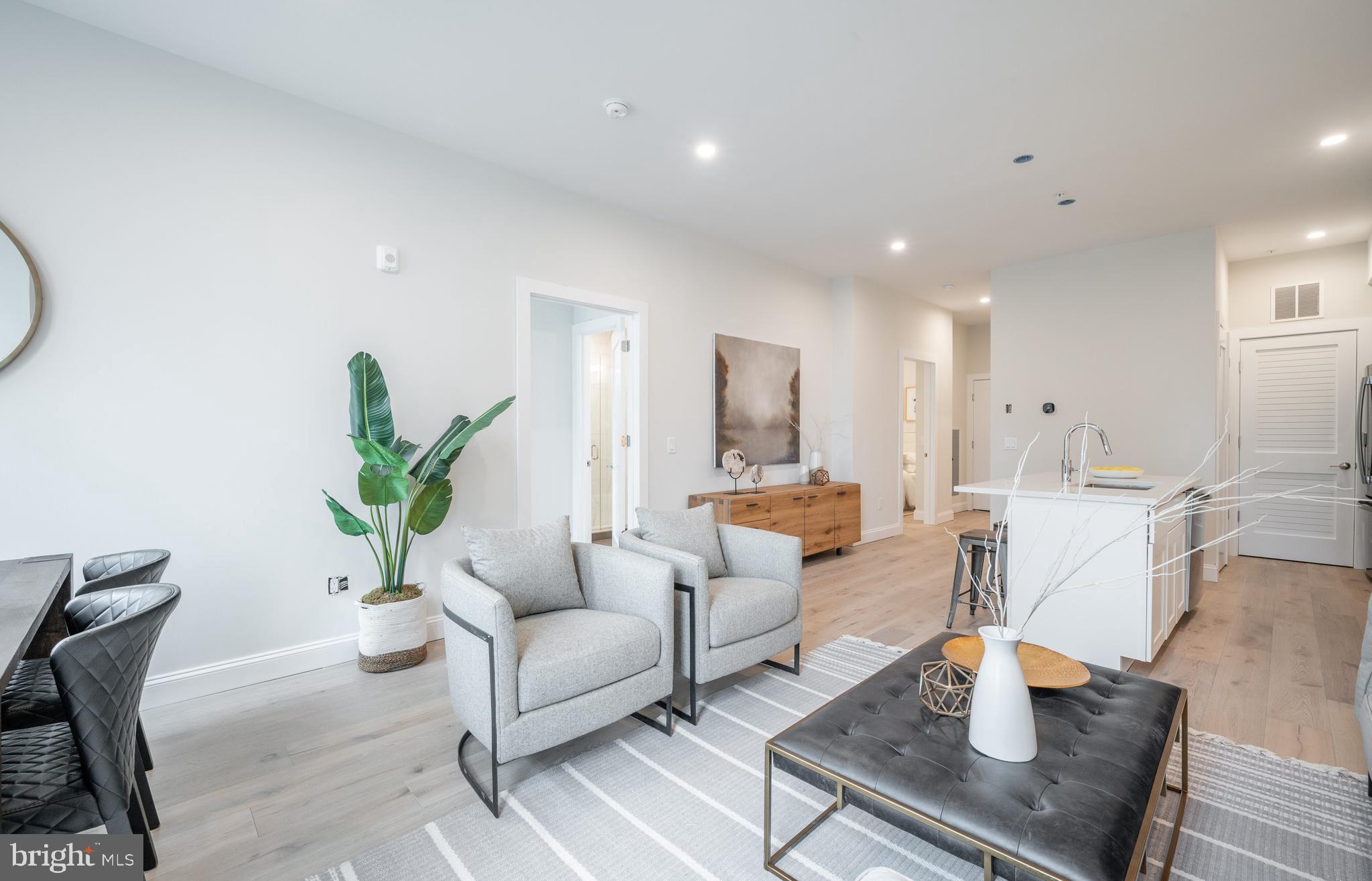 4319 Harrison Street Northwest, Unit 4 Washington, DC 20015 - Photo 12 of 13 Open + airy floor plan