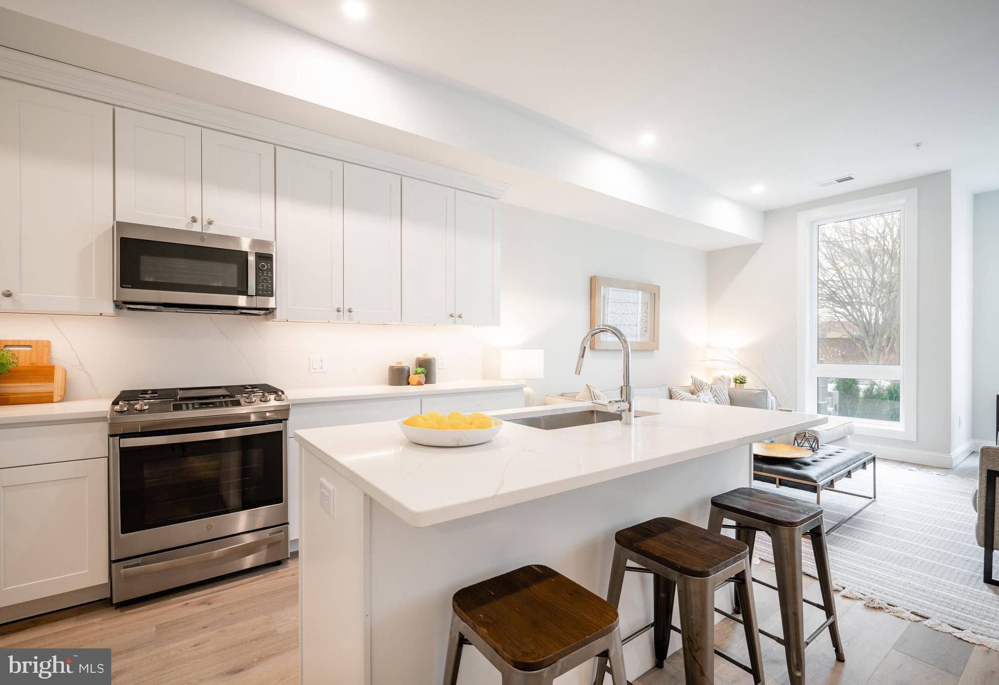 4319 Harrison Street Northwest, Unit 4 Washington, DC 20015 - Photo 5 of 13 Crisp white kitchen