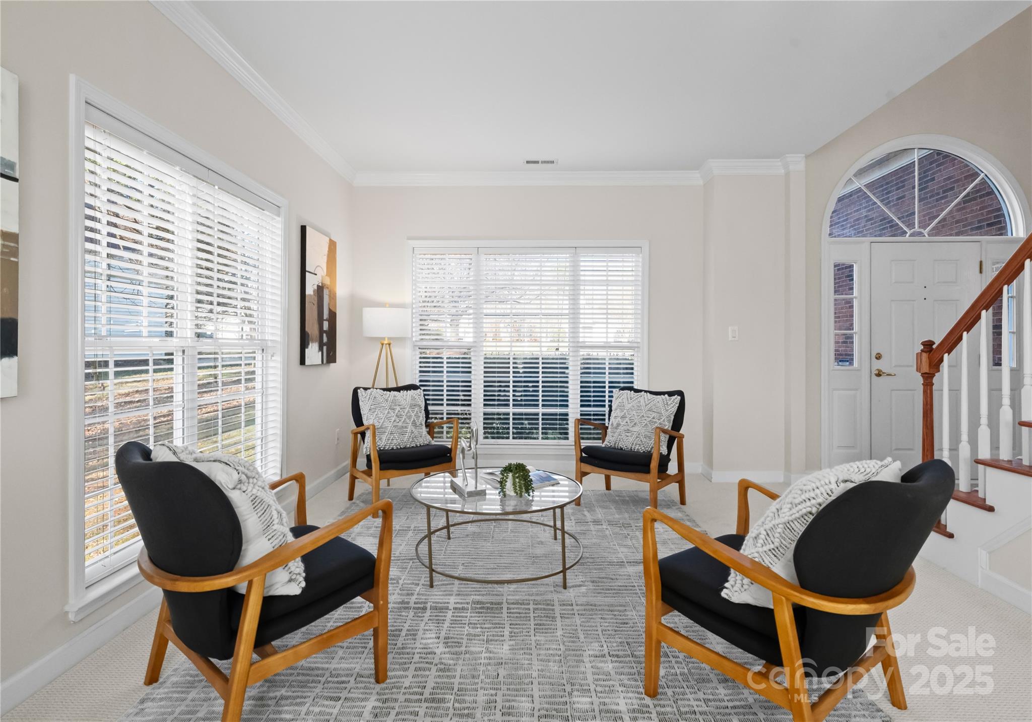1736 Walnut Crest Lane Matthews, NC 28105 - Photo 11 of 41 a living room with furniture and a floor to ceiling window