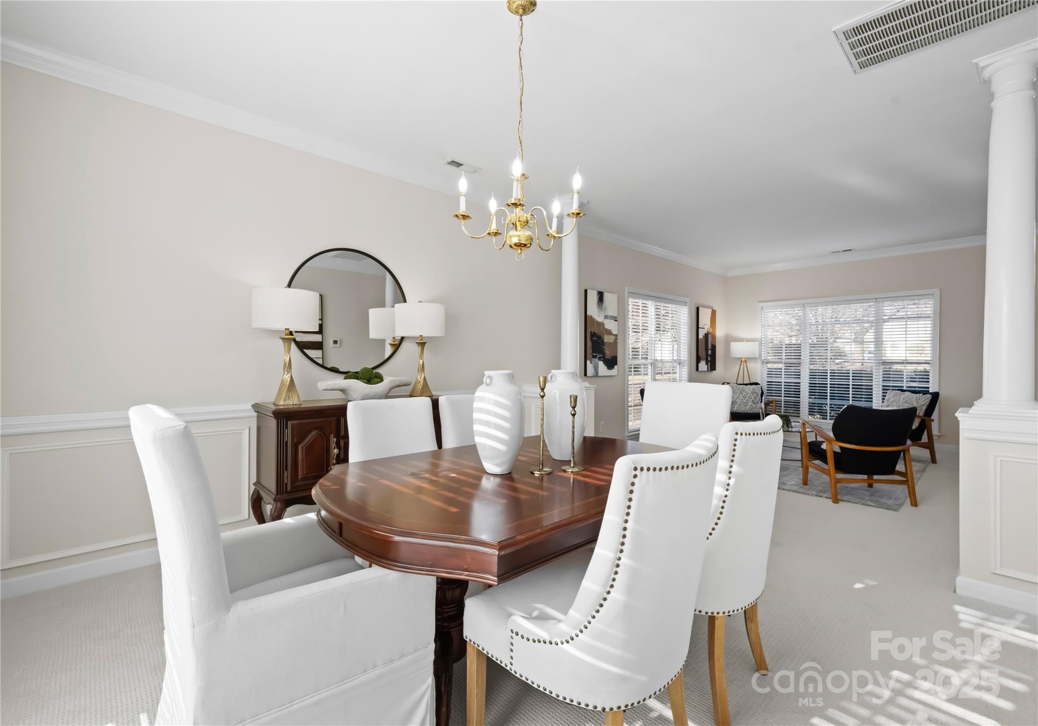 1736 Walnut Crest Lane Matthews, NC 28105 - Photo 15 of 41 a view of a dining room with furniture and chandelier