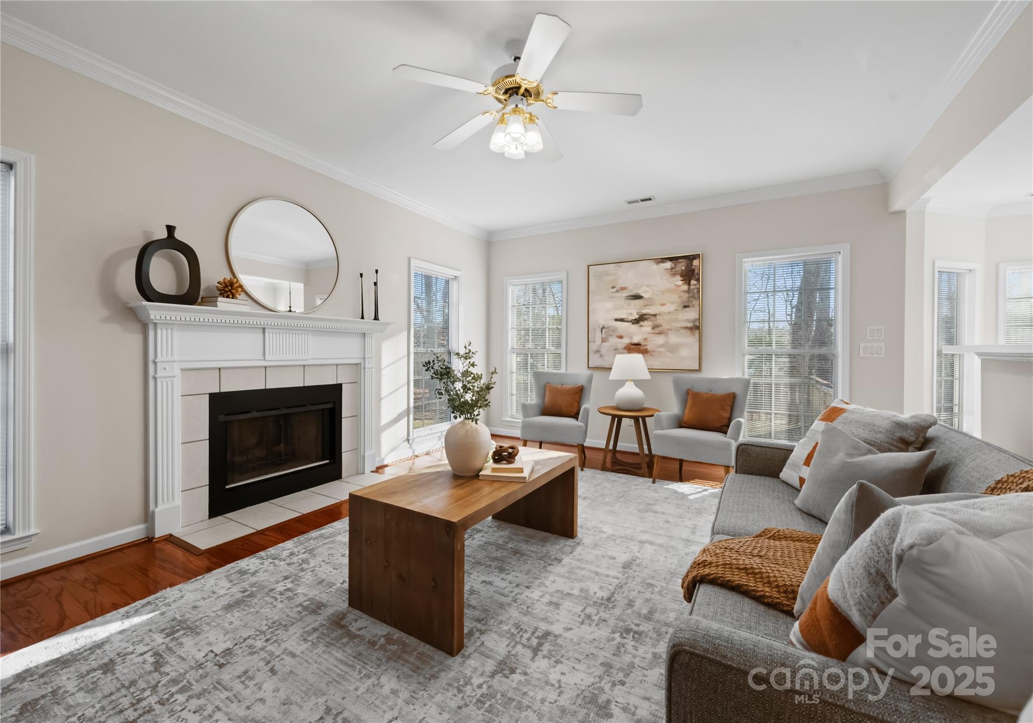 1736 Walnut Crest Lane Matthews, NC 28105 - Photo 6 of 41 a living room with furniture a fireplace and a large window