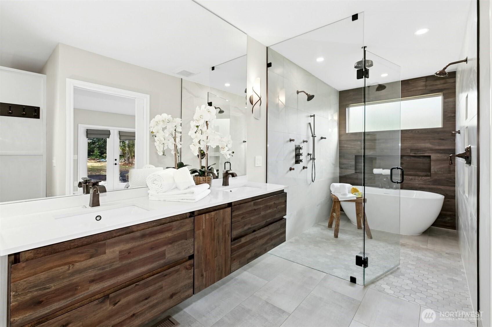 13020 172nd Avenue Southeast Renton, WA 98059 - Photo 16 of 40 a spacious bathroom with a double vanity sink mirror and bathtub