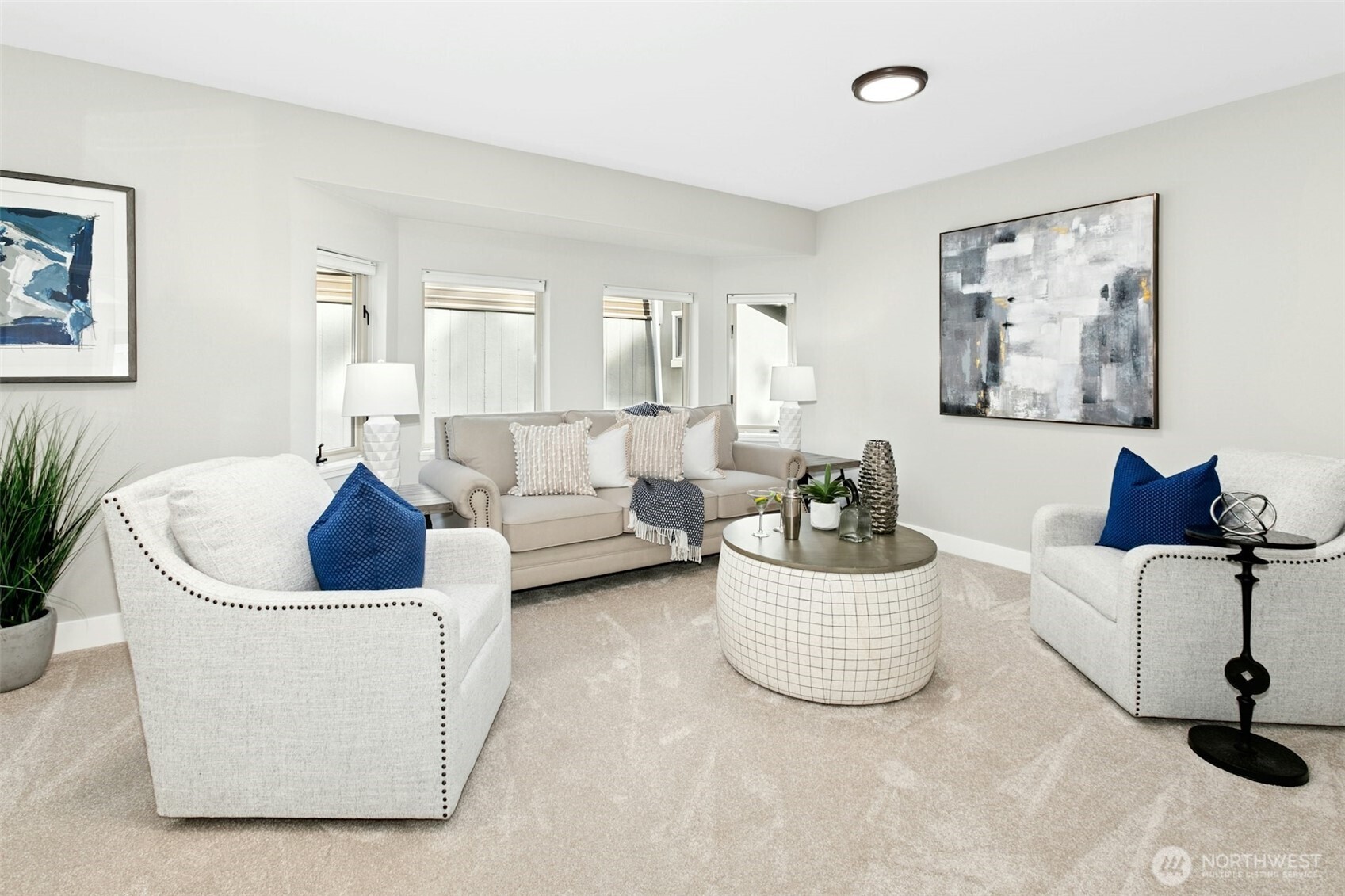 13020 172nd Avenue Southeast Renton, WA 98059 - Photo 19 of 40 a living room with furniture and white walls