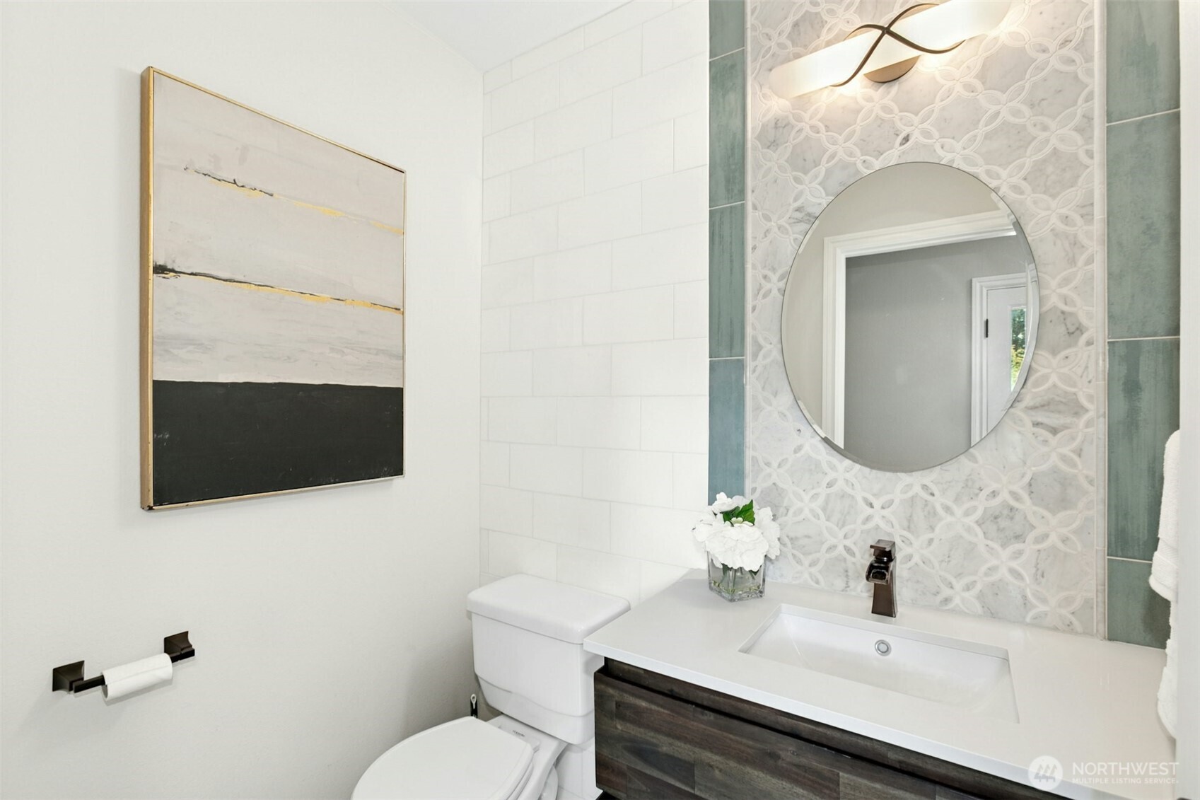 13020 172nd Avenue Southeast Renton, WA 98059 - Photo 21 of 40 a bathroom with a sink and a mirror