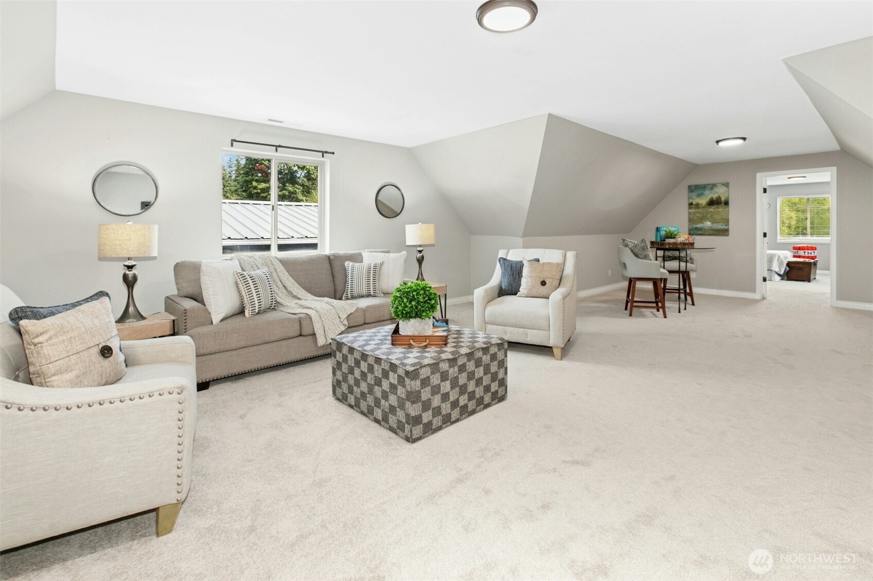 13020 172nd Avenue Southeast Renton, WA 98059 - Photo 27 of 40 a living room with furniture and a large window