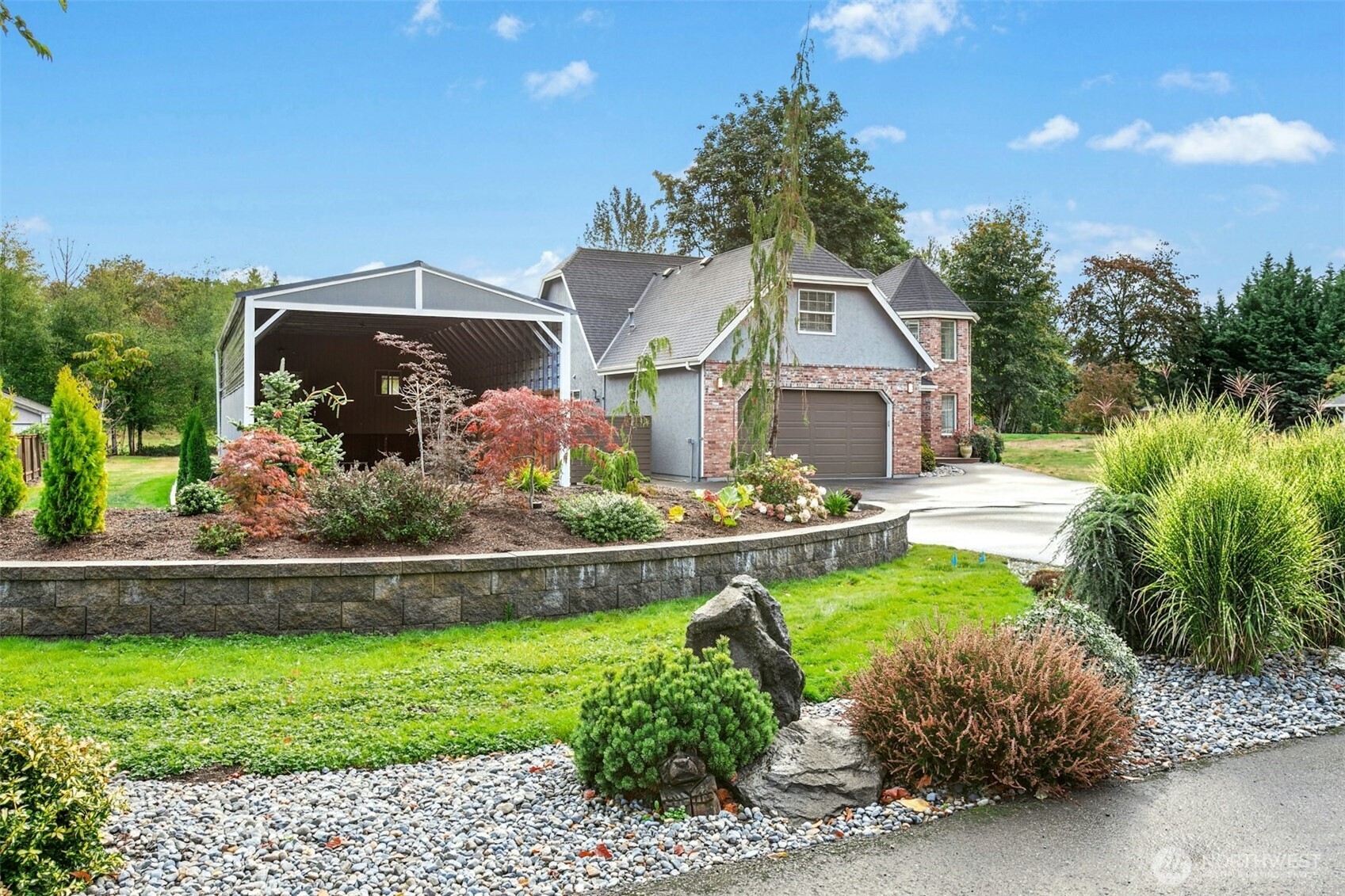13020 172nd Avenue Southeast Renton, WA 98059 - Photo 3 of 40 a front view of a house with garden