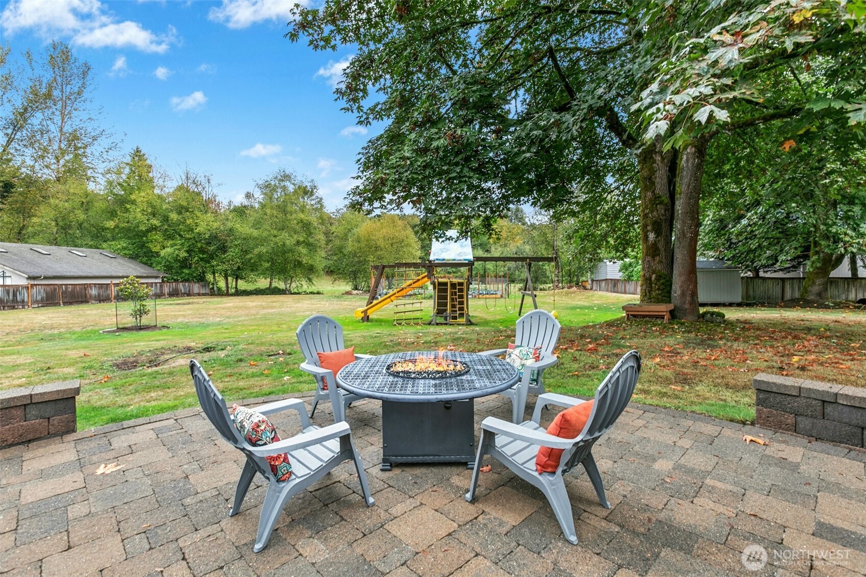 13020 172nd Avenue Southeast Renton, WA 98059 - Photo 37 of 40 a backyard of a house with outdoor seating