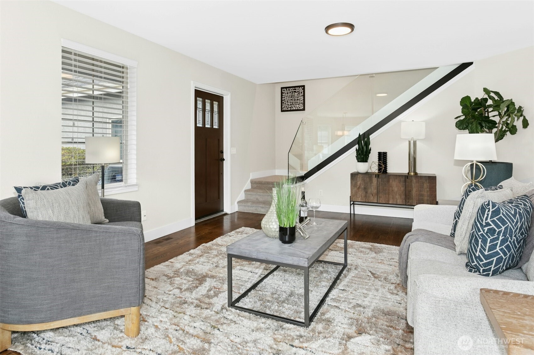 13020 172nd Avenue Southeast Renton, WA 98059 - Photo 8 of 40 a living room with furniture and wooden floor