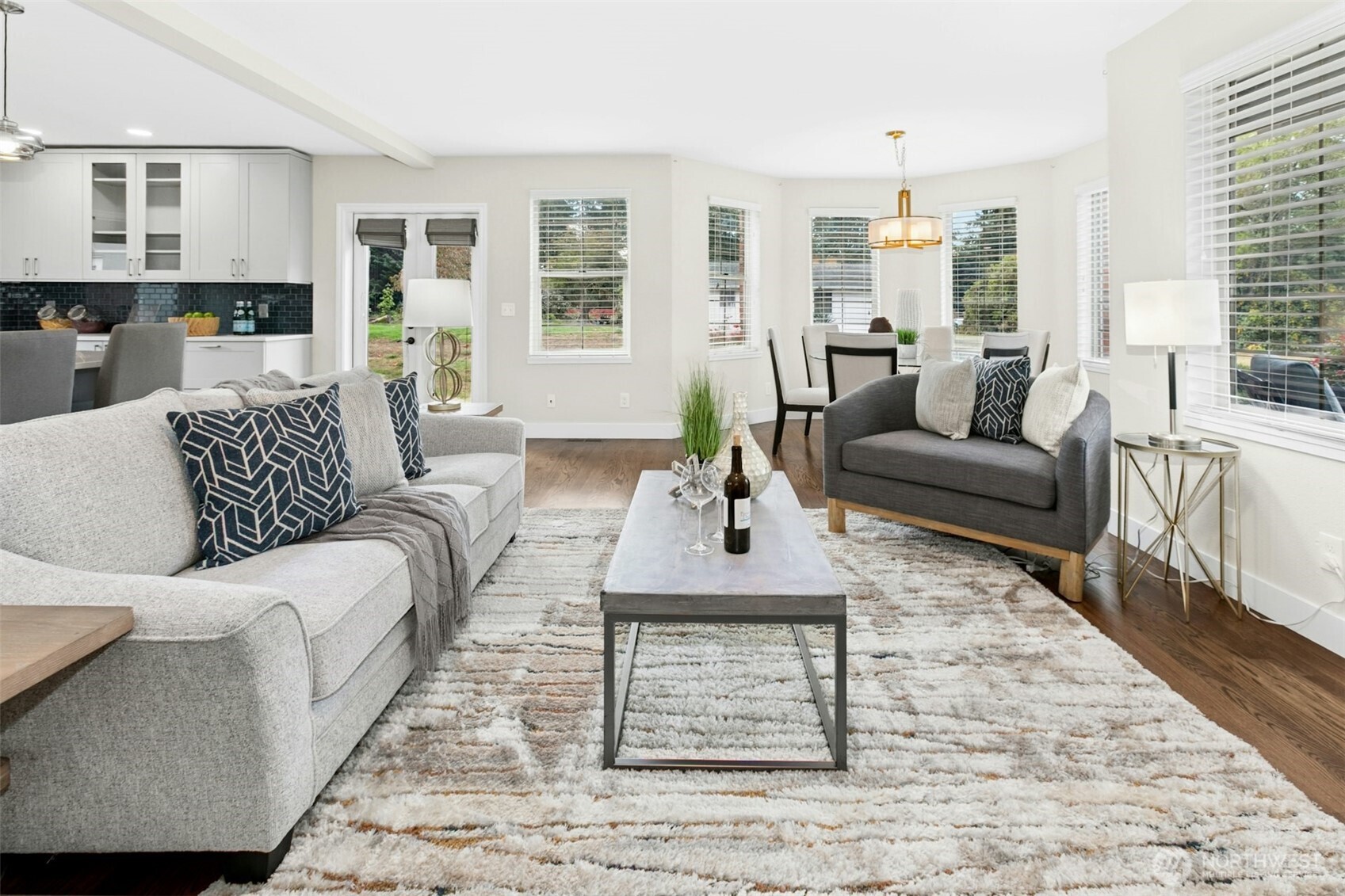 13020 172nd Avenue Southeast Renton, WA 98059 - Photo 9 of 40 a living room with furniture and a large window