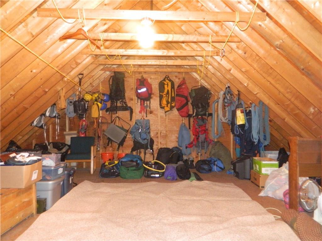 13 Marginal Way Springvale, ME 04083 - Photo 28 of 35 Storage area above garage. Space...