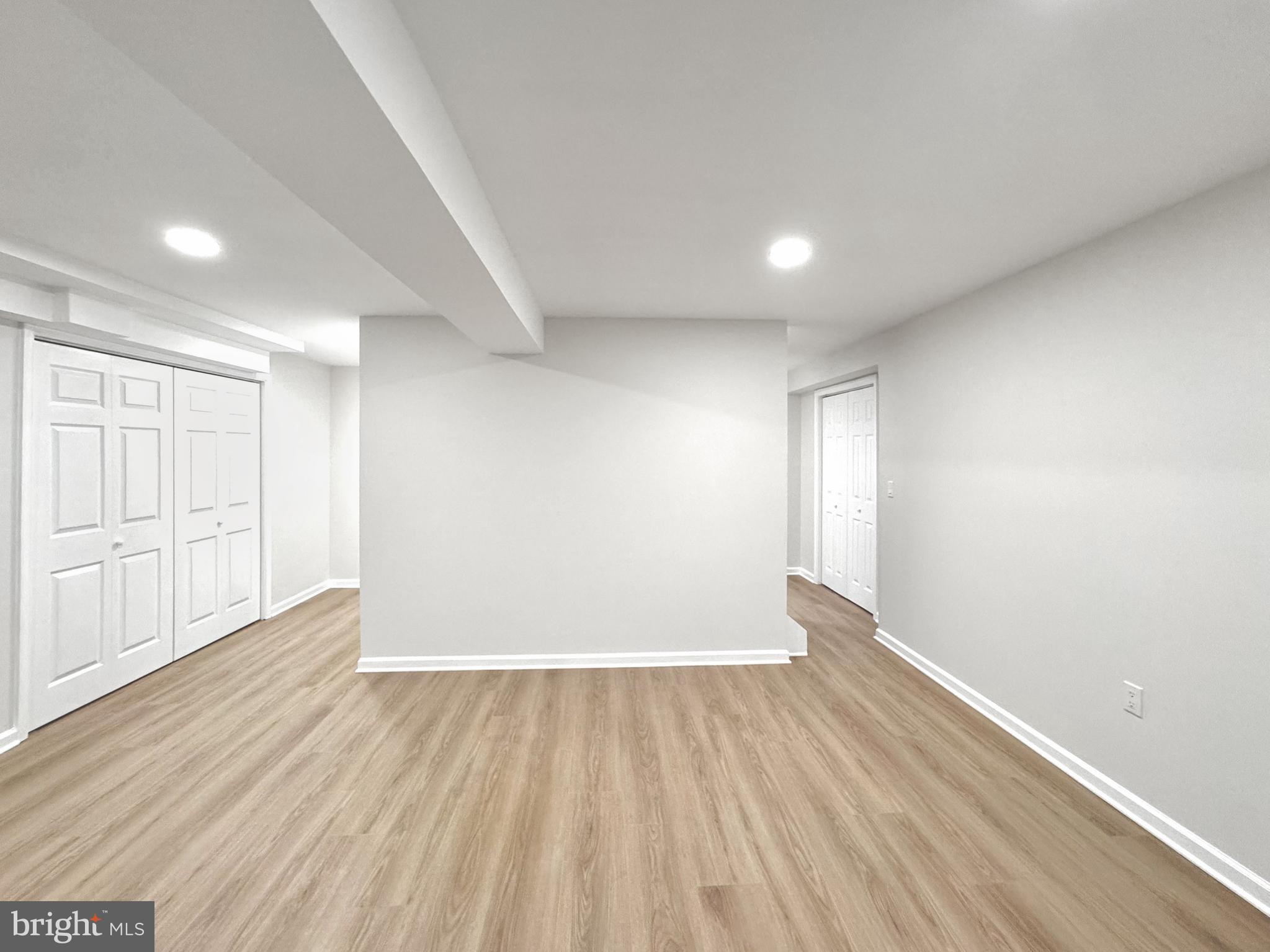 640 Santa Fe Trail Lusby, MD 20657 - Photo 26 of 32 wooden floor in an empty room with a window