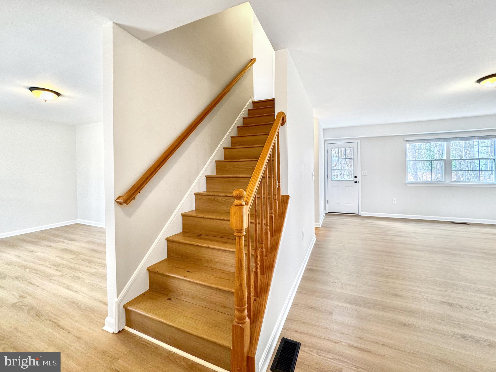 640 Santa Fe Trail Lusby, MD 20657 - Photo 6 of 32 a view of an entryway with wooden floor
