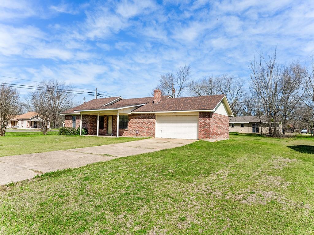 364 Barnes Street Fairfield, TX 75840 - Photo 1 of 1 a front view of a house with a yard