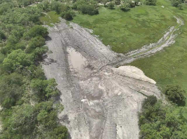 a view of a road with a yard