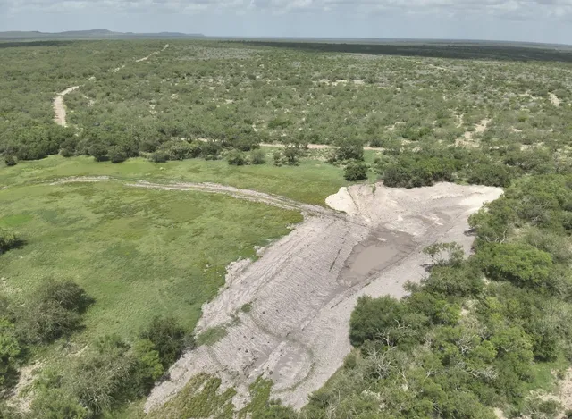 a view of a lake with a mountain