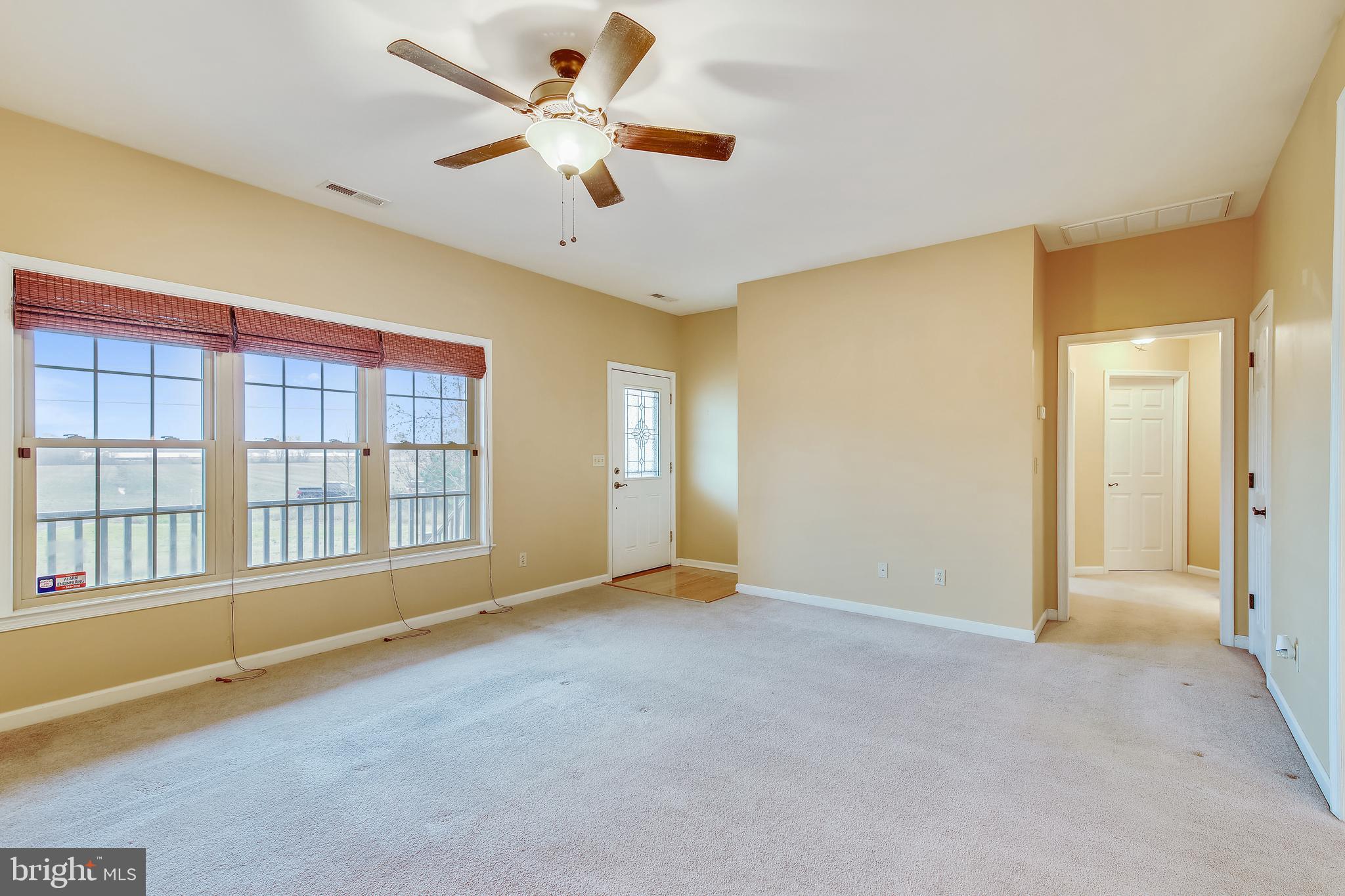 9248 Bethel Road Willards, MD 21874 - Photo 8 of 47 a view of an empty room with a window