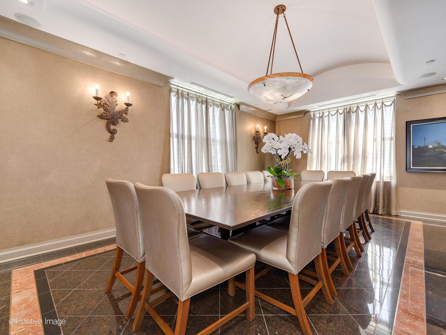 55 West Delaware Place, Unit 1101 Chicago, IL 60610 - Photo 19 of 41 a view of a dining room with furniture window and chandelier