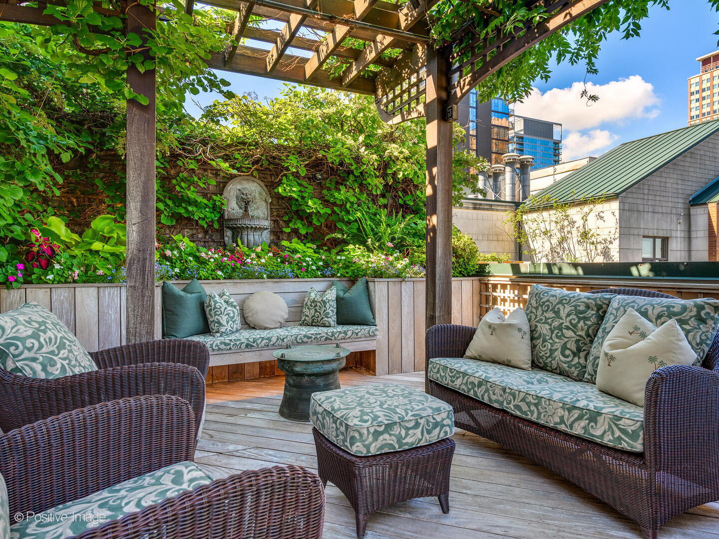 55 West Delaware Place, Unit 1101 Chicago, IL 60610 - Photo 2 of 41 a view of a patio with couches potted plants and outdoor seating