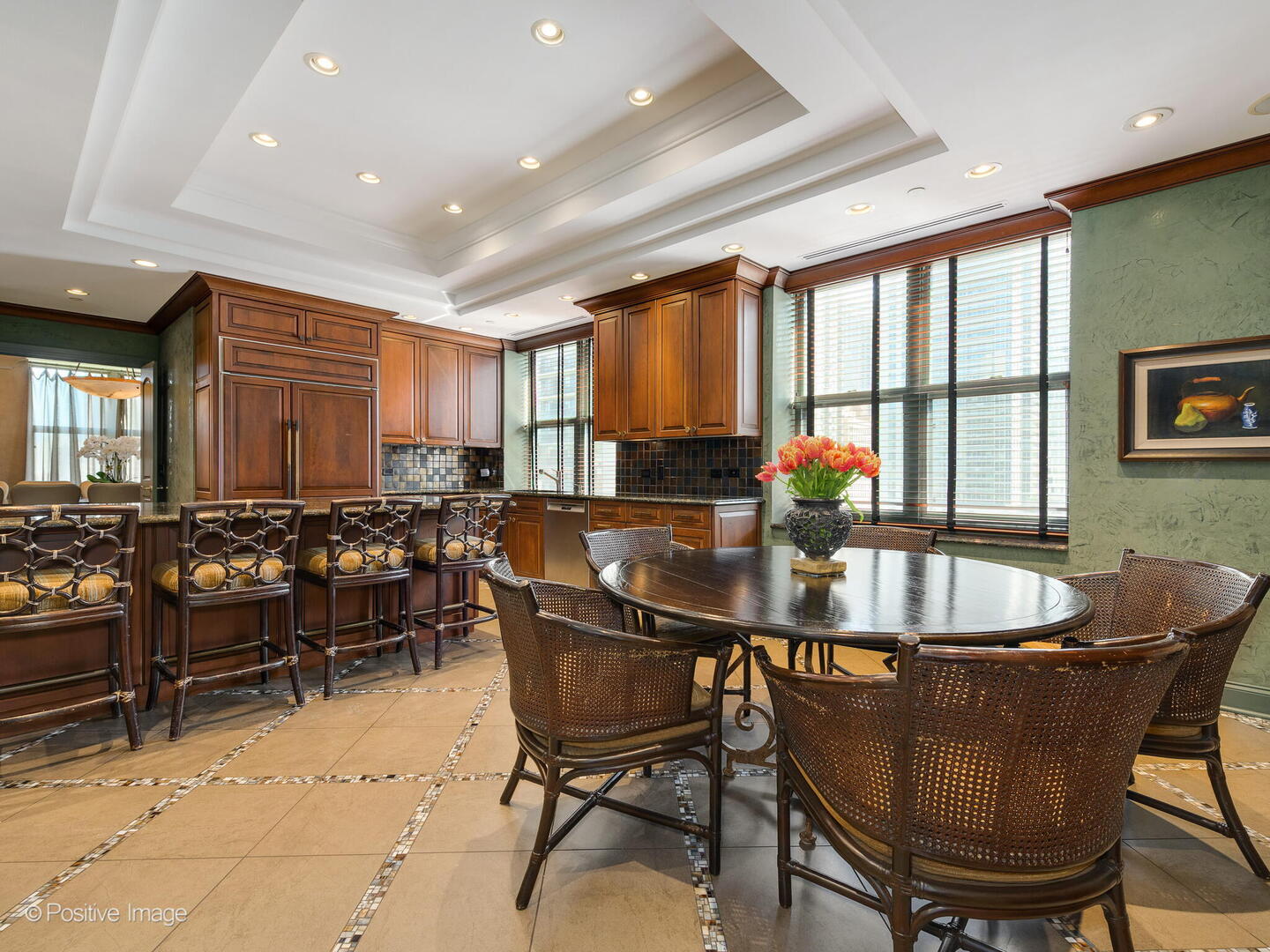 55 West Delaware Place, Unit 1101 Chicago, IL 60610 - Photo 23 of 41 a dining room with furniture window and wooden floor