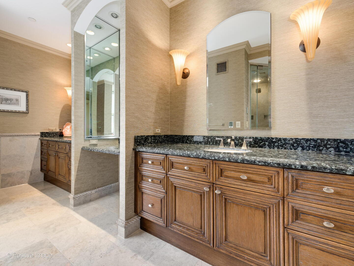 55 West Delaware Place, Unit 1101 Chicago, IL 60610 - Photo 33 of 41 a bathroom with a granite countertop sink and a mirror