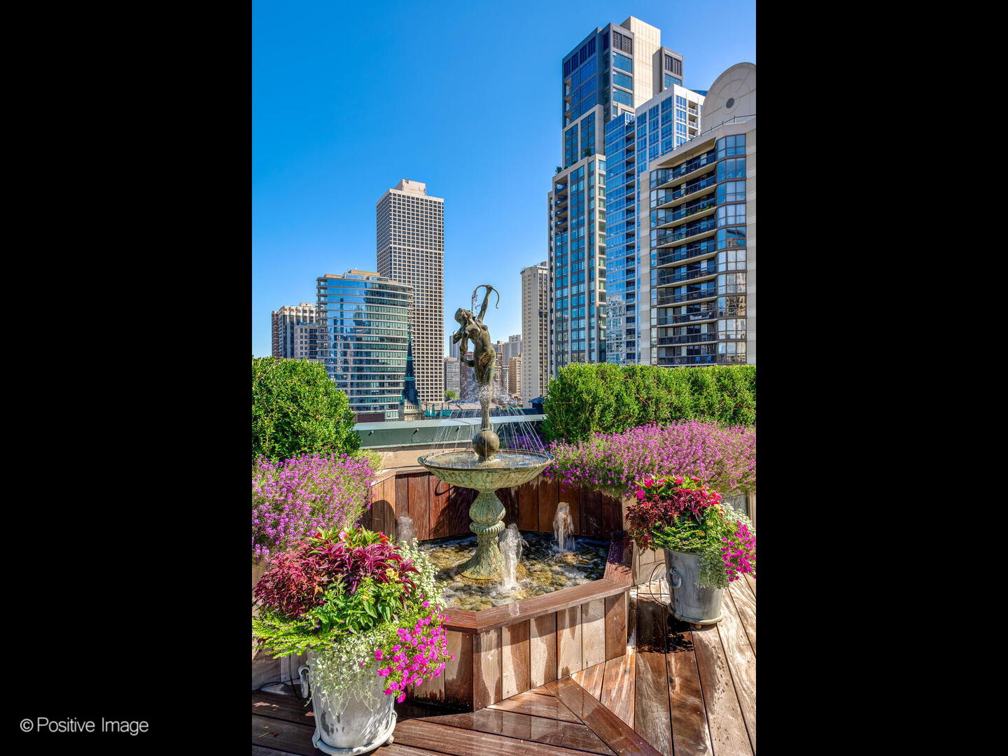 55 West Delaware Place, Unit 1101 Chicago, IL 60610 - Photo 7 of 41 a view of a city with tall buildings