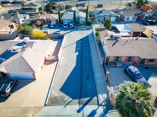 a living room with furniture a rug and a flat screen tv