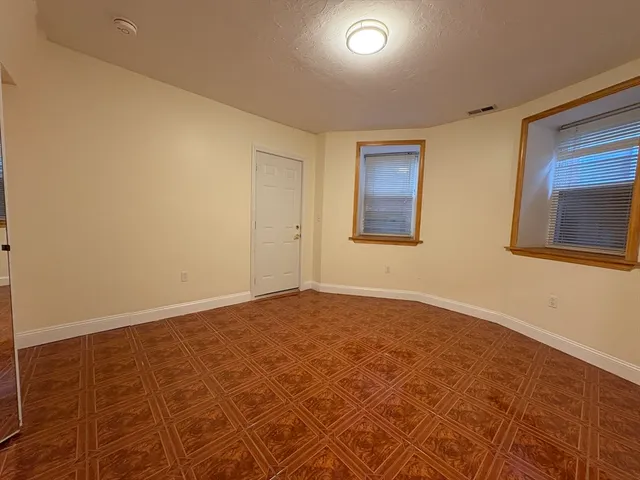 an empty room with a workbench